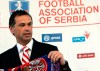 FILE - In this July 21, 2006 file photo, Red Star Belgrade soccer club director Zvezdan Terzic poses in Belgrade, Serbia. Terzic says he has tested positive for the coronavirus, days after the Serbian champions played matches in front of thousands of fans despite the pandemic. (AP Photo/Darko Vojinovic, File)