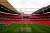 Empty stands before the English FA Women's Community Shield soccer match between Chelsea and Manchester City at Wembley stadium in London, Saturday, Aug. 29, 2020. (Andrew Couldridge/Pool via AP)