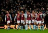 Aston Villa's Conor Hourihane, second left, celebrates with teammates after scoring his side's opening goal during the English League Cup quarter final soccer match between Aston Villa and Liverpool at Villa Park in Birmingham, England, Tuesday, Dec. 17, 2019. (AP Photo/Rui Vieira)
