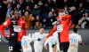 Marseille's Kevin Strootman, center, celebrates with teammates after scoring his side's opening goal during the League One soccer match between Rennes and Marseille, at the Roazhon Park stadium in Rennes, France, Friday, Jan. 10, 2020. (AP Photo/David Vincent)