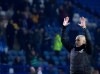 Manchester City's head coach Pep Guardiola celebrates at the end of the FA Cup fifth round soccer match between Sheffield Wednesday and Manchester City at Hillsborough in Sheffield, England, Wednesday, March 4, 2020. (AP Photo/Rui Vieira)