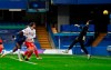 Chelsea's Tammy Abraham, left, scores his side's second goal during the English FA Cup fourth round soccer match between Chelsea and Luton Town at Stamford Bridge Stadium in London, Sunday, Jan. 24, 2021. (AP Photo/Ian Walton)