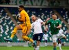 United States's goalkeeper Zack Steffen, left, makes a save in front of Northern Ireland's Matty Kennedy, right, during an international friendly soccer match between Northern Ireland and United States, at Windsor Park, Belfast, Northern Ireland, Sunday, March 28, 2021. (AP Photo/Peter Morrison)