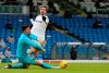 Burnley's goalkeeper Nick Pope, left, tries to block a shot from Leeds United's Patrick Bamford during the English Premier League soccer match between Leeds United and Burnley at Elland Road Stadium in Leeds, England, Sunday, Dec. 27, 2020. (Nigel French/Pool via AP)