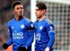 Leicester's Demarai Gray, left, celebrates with Leicester's Ayoze Perez after scoring his side's second goal during the English Premier League soccer match between West Ham Utd and Leicester City at the London Stadium in London, Saturday, Dec. 28, 2019. (AP Photo/Petros Karadjias)