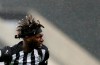 Newcastle's Allan Saint-Maximin celebrates after scoring his side's opening goal during the English Premier League soccer match between Newcastle United and Burnley at St. James' Park in Newcastle, England, Saturday, Oct. 3, 2020. (AP Photo/Scott Heppell, Pool)