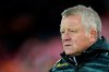 Sheffield United's manager Chris Wilder waits for the start of the English Premier League soccer match between Liverpool and Sheffield United at Anfield Stadium, Liverpool, England, Thursday, Jan. 2, 2020. (AP Photo/Jon Super)