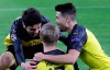 Dortmund's Erling Braut Haaland, center, celebrates with teammates after scoring his side's opening goal during the Champions League round of 16 first leg soccer match between Borussia Dortmund and Paris Saint Germain in Dortmund, Germany, Tuesday, Feb. 18, 2020. (AP Photo/Michael Probst)