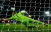 Chelsea's Jorginho scores his side's opening goal from the penalty spot during the English Premier League soccer match between Chelsea and Arsenal at Stamford Bridge Stadium in London, Tuesday, Jan. 21, 2020. (AP Photo/Matt Dunham)