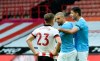 Manchester City's Kyle Walker, centre, celebrates with Manchester City's Rodrigo after scoring his side's opening goal during the English Premier League soccer match between Sheffield United and Manchester City at Bramall Lane stadium in Sheffield, England, Saturday, Oct. 31, 2020. (AP Photo/Rui Vieira, Pool)