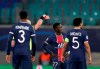 Referee Szymon Marciniak shows a red card to PSG's Idrissa Gueye, second right, during the Champions League group H soccer match between RB Leipzig and Paris Saint Germain at the RB Arena in Leipzig, Germany, Wednesday, Nov. 4, 2020. (AP Photo/Michael Sohn)