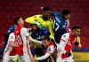 Ajax's goalkeeper Andre Onana, top centre, makes a save during the group D Champions League soccer match between Ajax and Atalanta at the Johan Cruyff ArenA in Amsterdam, Netherlands, Wednesday, Dec. 9, 2020. (AP Photo/Peter Dejong)