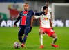 PSG's Rafinha, left, duels for the ball with Leipzig's Christopher Nkunku during the Champions League group H soccer match between RB Leipzig and Paris Saint Germain at the RB Arena in Leipzig, Germany, Wednesday, Nov. 4, 2020. (AP Photo/Michael Sohn)