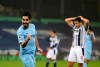 Manchester City's Ilkay Gundogan, left, celebrates after scoring his side's third goal during the English Premier League soccer match between West Bromwich Albion and Manchester City at the Hawthorns stadium in West Bromwich, England, Tuesday, Jan. 26, 2021. (Nick Potts/Pool via AP)