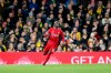 Liverpool's Sadio Mane celebrates after scoring his side's opening goal during the English Premier League soccer match between Norwich City and Liverpool at Carrow Road Stadium in Norwich, England, Saturday, Feb. 15, 2020. (AP Photo/Frank Augstein)