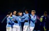 Manchester City's Phil Foden celebrates with teammates after scoring his side's fourth goal during the Champions League group C soccer match between Dinamo Zagreb and Manchester City at Maksimir Stadium in Zagreb, Croatia, Wednesday, Dec. 11, 2019. (AP Photo/Darko Bandic)