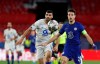 Chelsea's Cesar Azpilicueta, right, duels for the ball with Porto's Mehdi Taremi during the Champions League quarter final second leg soccer match between Chelsea and Porto at the Ramon Sanchez Pizjuan stadium, in Seville, Spain, Tuesday, April 13, 2021. (AP Photo/Angel Fernandez)