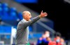 Augsburg's head coach Heiko Herrlich gives instructions to his players during the German Bundesliga soccer match between FC Schalke 04 and FC Augsburg at the Veltins-Arena in Gelsenkirchen, Germany, Sunday, May 24, 2020. The German Bundesliga becomes the world's first major soccer league to resume after a two-month suspension because of the coronavirus pandemic. (AP Photo/Martin Meissner, Pool)
