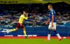 Burnley's Dwight McNeil, left, celebrates after scoring his side's second goal duels for the ball with during the English Premier League soccer match between Everton and Burnley at Goodison Park in Liverpool, England, Saturday, March 13, 2021. (AP Photo/Jon Super, Pool)