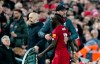 Liverpool's manager Jurgen Klopp embraces Liverpool's Sadio Mane during the English Premier League soccer match between Liverpool and Sheffield United at Anfield Stadium, Liverpool, England, Thursday, Jan. 2, 2020. (AP Photo/Jon Super)