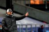 Liverpool's manager Jurgen Klopp gives instructions to his players during the English Premier League soccer match between Crystal Palace and Liverpool at Selhurst Park stadium in London, Saturday, Dec. 19, 2020. (Clive Rose/Pool via AP)