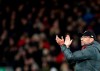 Liverpool's manager Jurgen Klopp applauds to supporters at the end of the English Premier League soccer match between Liverpool and Sheffield United at Anfield Stadium, Liverpool, England, Thursday, Jan. 2, 2020. (AP Photo/Jon Super)