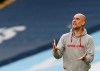 Manchester City's head coach Pep Guardiola reacts during the English Premier League soccer match between Manchester City and West Ham United at the Etihad stadium in Manchester, England, Saturday, Feb. 27, 2021. (Martin Rickett/Pool via AP)