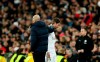 Real Madrid's Sergio Ramos, front right, walks off the pitch by Real Madrid's head coach Zinedine Zidane, front left, during the Champions League, round of 16, first leg soccer match between Real Madrid and Manchester City at the Santiago Bernabeu stadium in Madrid, Spain, Wednesday, Feb. 26, 2020. (AP Photo/Manu Fernandez)