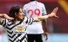 Manchester United's Edinson Cavani celebrates after scoring his side's third goal during the English Premier League soccer match between Aston Villa and Manchester United at Villa Park in Birmingham, England, Sunday, May 9, 2021. (Shaun Botterill/Pool via AP)