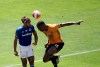 Everton's Dominic Calvert-Lewin, left, duels for the ball with Wolverhampton Wanderers' Willy Boly during the English Premier League soccer match between Watford and Everton at the Molineux Stadium in Wolverhampton, England, Sunday, July 12, 2020. (Molly Darlington/Pool via AP)