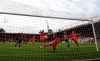 Bournemouth's Dan Gosling, second right, scores his side's opening goal during the English Premier League soccer match between Bournemouth and Newcastle at Vitality Stadium in Bournemouth, England, Wednesday, July 1, 2020. (Peter Cziborra/Pool via AP)