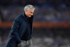 Tottenham's manager Jose Mourinho walks on the pitch at the end of the English Premier League soccer match between Everton and Tottenham Hotspur at Goodison Park in Liverpool, England, Friday, April 16, 2021. (Peter Powell/Pool via AP)