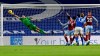Aston Villa's goalkeeper Emiliano Martinez, left, makes a save during the English Premier League soccer match between Brighton and Aston Villa at the Falmer stadium in Brighton, England, Saturday, Feb. 13, 2021. (Neil Hall/Pool via AP)