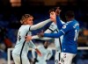 Chelsea's Reece James, left, discusses with Everton's Abdoulaye Doucoure, right, during the English Premier League soccer match between Everton and Chelsea at Goodison Park in Liverpool, England, Saturday, Dec. 12, 2020. (AP Photo/Jon Super, Pool)