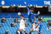 Chelsea's Mason Mount, front, duels for the ball with Fulham's Mario Lemina, left, during the English Premier League soccer match between Chelsea and Fulham at Stamford Bridge Stadium in London, Saturday, May 1, 2021. (Neill Hall/Pool via AP)