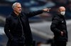 Tottenham coach Jose Mourinho gestures during the English Premier League soccer match between Tottenham and Newcastle at the Tottenham Hotspur Stadium in London, Sunday, Sept. 27, 2020. (Daniel Leal-Olivas/Pool via AP)