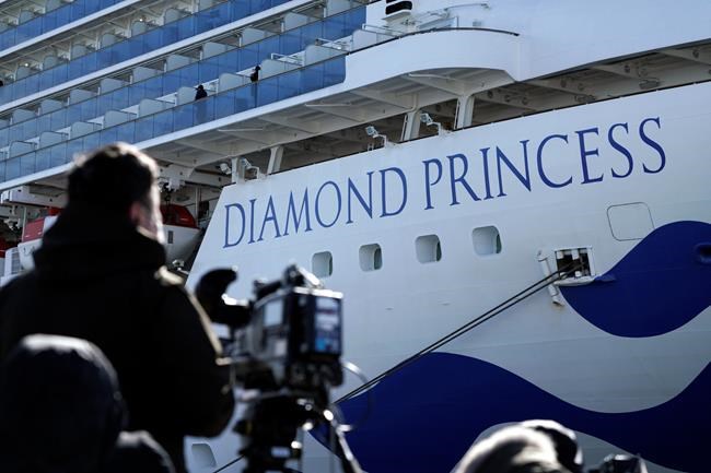 The cruise ship Diamond Princess is anchored at Yokohama Port for supplies replenished in Yokohama, south of Tokyo, Thursday, Feb. 6, 2020. Health workers said 10 more people from the Diamond Princess were confirmed ill with the virus, in addition to 10 others who tested positive on Wednesday. They were dropped off as the ship docked and transferred to nearby hospitals for further test and treatment. (AP Photo/Eugene Hoshiko)