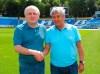 Dynamo Kyiv president Igor Surkis, left, shakes hands with newly appointed Romanian head coach Mircea Lucescu at Dynamo stadium in Kyiv, Ukraine, Thursday, July 23, 2020. Dynamo Kyiv soccer club and Mircea Lucescu have signed a two-year contract Thursday. (AP photo/Andrey Lukatsky)