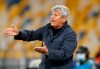 Dynamo Kiev's head coach Mircea Lucescu gives instructions during the Champions League Play-offs, 2nd leg soccer match between Gent and Dynamo Kyiv at the Olimpiyskiy Stadium in Kyiv, Ukraine, Tuesday, Sept. 29, 2020. (AP Photo/Efrem Lukatsky)
