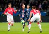 PSG's Neymar, center, is challenged by Monaco's Cesc Fabregas, left, and Benjamin Henrichs during the French League One soccer match between Paris-Saint-Germain and Monaco at the Parc des Princes stadium in Paris, Sunday Jan. 12, 2020. (AP Photo/Francois Mori)