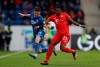 Hoffenheim's Christoph Baumgartner, left, and Bayern's David Alaba challenge for the ball during a German Bundesliga soccer match between TSG 1899 Hoffenheim and Bayern Munich in Sinsheim, Germany, Saturday, Feb. 29, 2020. (AP Photo/Michael Probst)