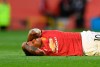 Manchester United's Marcus Rashford reacts injured at the ground during the English Premier League soccer match between Manchester United and Crystal Palace at the Old Trafford stadium in Manchester, England, Saturday, Sept. 19, 2020. (Shaun Botterill/Pool via AP)