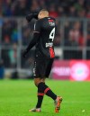 Leverkusen's Jonathan Tah walks off the pitch after he got the red card during the German Bundesliga first devision soccer match between FC Bayern Munich and bayer Leverkusen 04 in Munich, Germany, Saturday, Nov. 30, 2019. (AP Photo/Matthias Schrader)