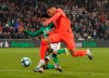 PSG's Kylian Mbappe challenges for the ball with Saint-Etienne's Wesley Fofana during the French League One soccer match between Saint-Etienne and Paris Saint-Germain, at the Geoffroy Guichard stadium, in Saint-Etienne, central France, Sunday, Dec. 15, 2019. (AP Photo/Laurent Cipriani)