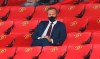 Manchester United Chief Executive Ed Woodward watches on during the English Premier League soccer match between Manchester United and Crystal Palace at the Old Trafford stadium in Manchester, England, Saturday, Sept. 19, 2020. (Richard Heathcote/Pool via AP)