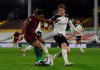 Wolverhampton Wanderers' Adama Traore scores the opening goal during the English Premier League soccer match between Fulham and Wolverhampton Wanderers at Craven Cottage stadium in London, England, Friday, April 9, 2021.(Glyn Kirk/Pool via AP)