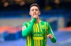 West Bromwich Albion's Callum Robinson celebrates scoring their fifth goal during the English Premier League soccer match between Chelsea and West Bromwich Albion at Stamford Bridge stadium in London, England, Saturday, April 3, 2021.(Mike Hewitt/Pool via AP)
