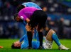 Manchester City's John Stones reacts injured at the ground during the English Premier League soccer match between Manchester City and Newcastle United at the Etihad Stadium in Manchester, England, Saturday, Dec., 26, 2020. (Jason Cairnduff/ Pool via AP)