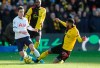 Tottenham's Giovani Lo Celso, left, is tailed by Watford's Etienne Capoue during the English Premier League soccer match between Watford and Tottenham Hotspur at Vicarage Road, Watford, England, Saturday, Jan. 18, 2020. (AP Photo/Frank Augstein)