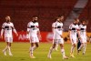 Brazil's Flamengo players leave the field at half-time during their Copa Libertadores soccer match against Ecuador's Independiente del Valle in Quito, Ecuador, Thursday, Aug. 17, 2020. (Jose Jacome/Pool via AP)